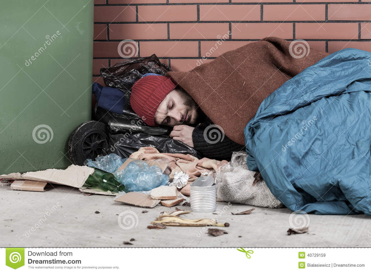 man-lying-street-poor-homeless-40729159.jpg