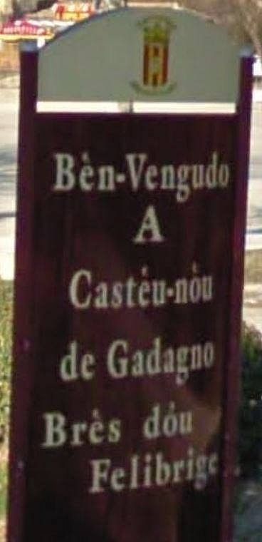Panneau de ville en provençal de Châteauneuf de Gadagne