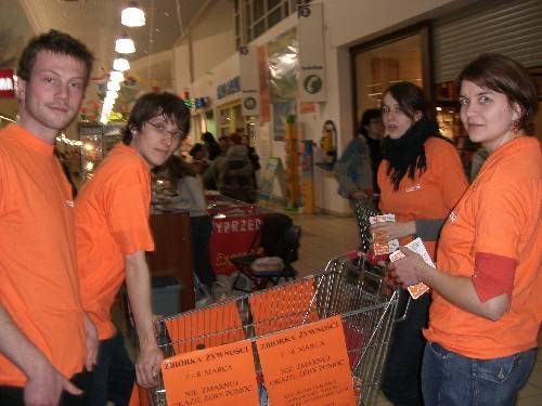 Volunteers near the trolleys