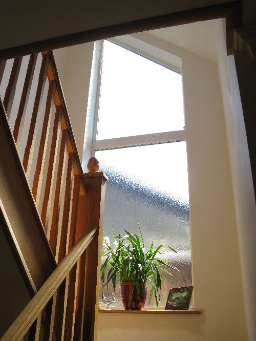 staircase and shaped window