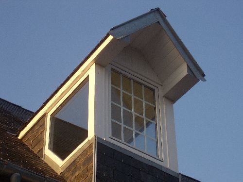 Finished dormer window with sidelights