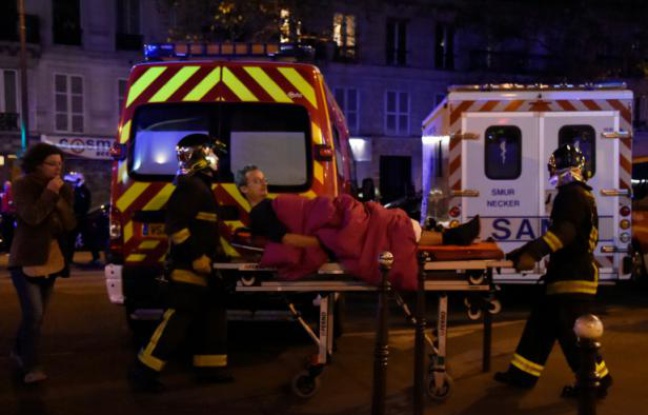 648x415_une_victime_des_attaques_de_paris_evacuee_par_des_pompiers_le_13_novembre_2015.jpg