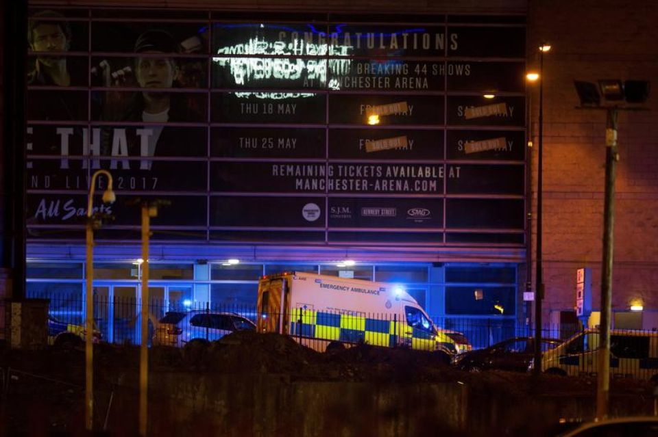 1024203-a-police-van-and-an-ambulance-are-seen-outside-the-manchester-arena-where-us-singer-ariana-grande-ha.jpg