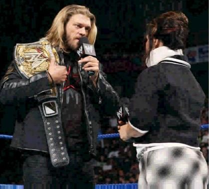 Edge et Vickie aprés la reprise de WWE Title au Survivor Series