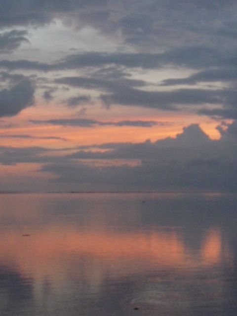 coucher de soleil avec Moorea en face de Tahiti
