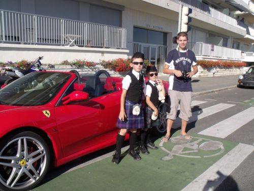 Ilan, Tom (the nice boys) and Swann (the bad boy) front a Ferrari