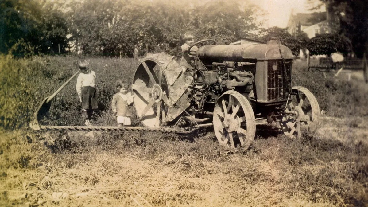 4 Kids-on-Tractor-1920s.jpg