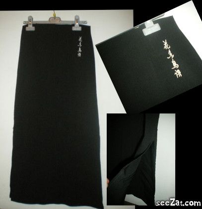 jupe noir longue symbole chinois taille 38: 4.5 euros 