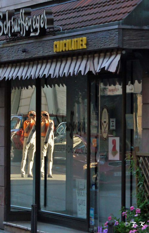 Reflet dans la vitrine