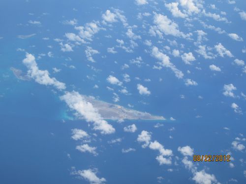 Photo prise de l'avion sur la mer des Caraïbes. - Photo take from the plane over the Carribean Sea