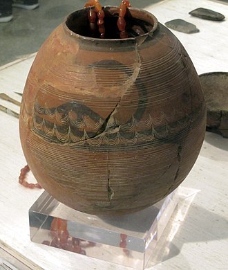 Horned_figure_on_pottery._Pré-Indus_civilization._Kashmir.jpg