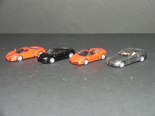 de gauche à droite: Enzo, 360 Modena, 430 spider, 612 Scaglietti. toutes de chez RedLine