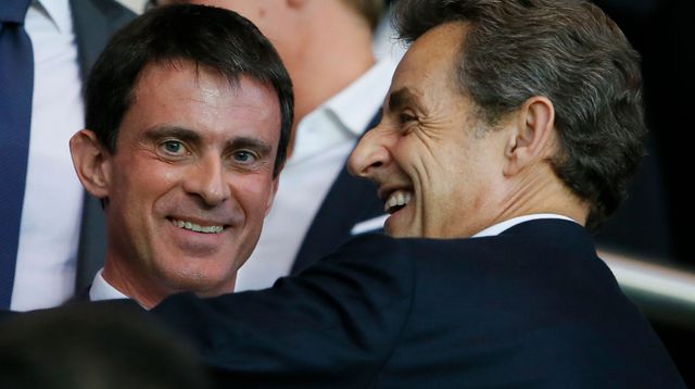french-prime-minister-valls-and-former-french-president-sarkozy-attend-the-champions-league-quarter-final-first-leg-between-paris-st-germain-and-barcel.jpg
