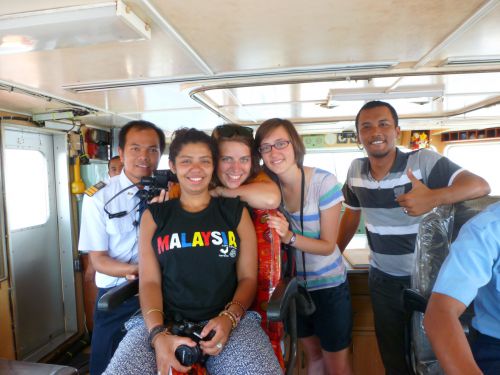 In the boat, with the capitaine