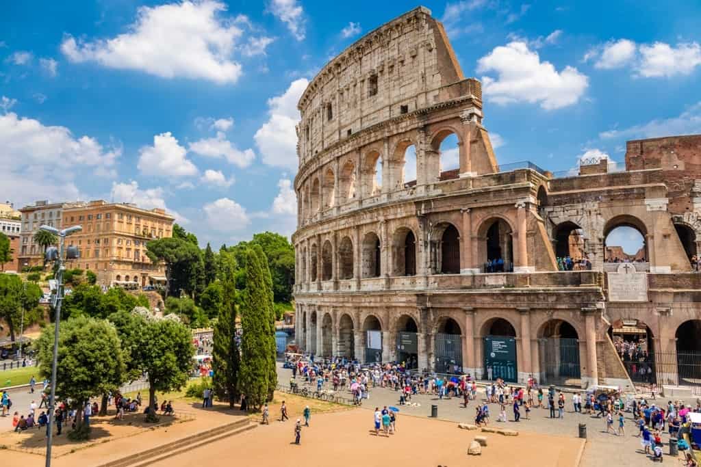 Colosseum-with-clear-blue-sky-Rome-Italy.-Rome-landmark-and-antique-architecture.-Rome-Colosseum-is-one-of-the-best-known-monuments-of-Rome-and-Italy-min.jpg