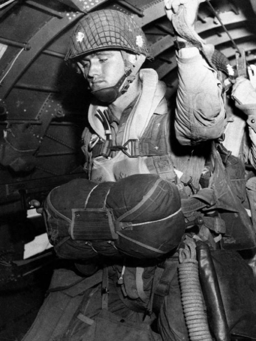 Paratrooper_about_to_jump_into_combat_on_1944-6-6.jpg