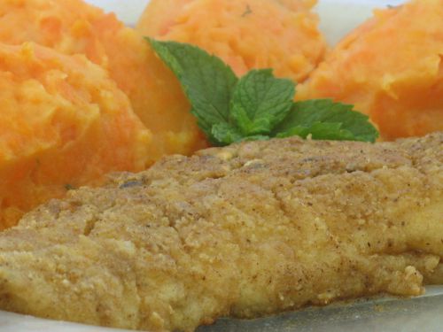 Filet de merlu aux épices et sa purée de carottes à la menthe