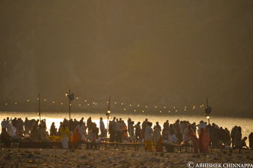 People offer prayers on the banks of the Ganga on a cold morning - Haridwar