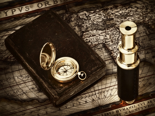 photodune-2935427-telescope-and-compass-at-antique-map-s.jpg