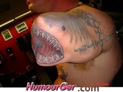 Requin_tattoo_sur_bras_amputation.thumb.jpeg