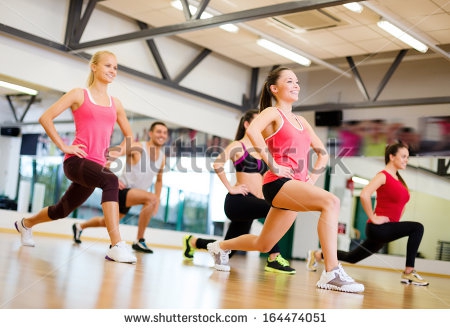 stock-photo-fitness-sport-training-gym-and-lifestyle-concept-group-of-smiling-people-exercising-in-the-gym-164474051.jpg