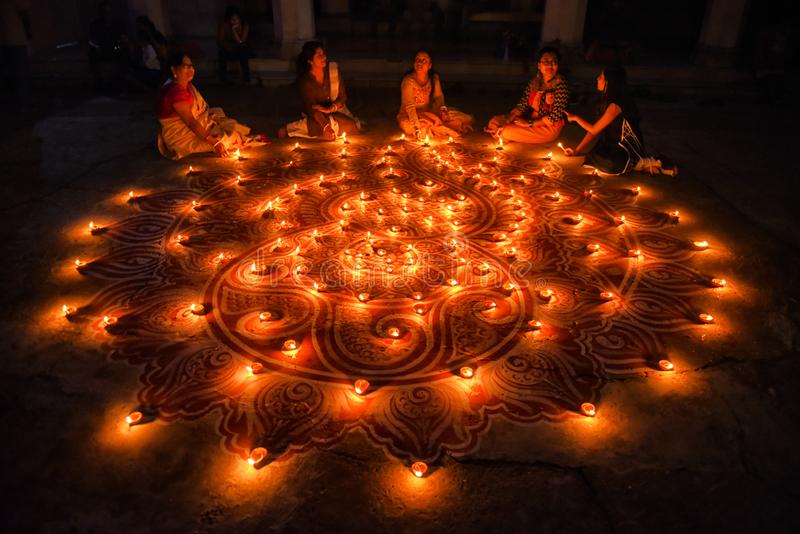 diwali-festival-india-family-members-bholanath-dham-dutta-bari-decorate-their-lawn-soil-made-diyas-kolkata-as-130932281.jpg