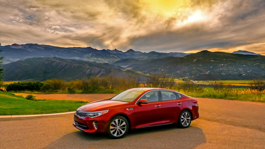 KIA Optima 2015 _red_side_view_mountains_108434_1600x900