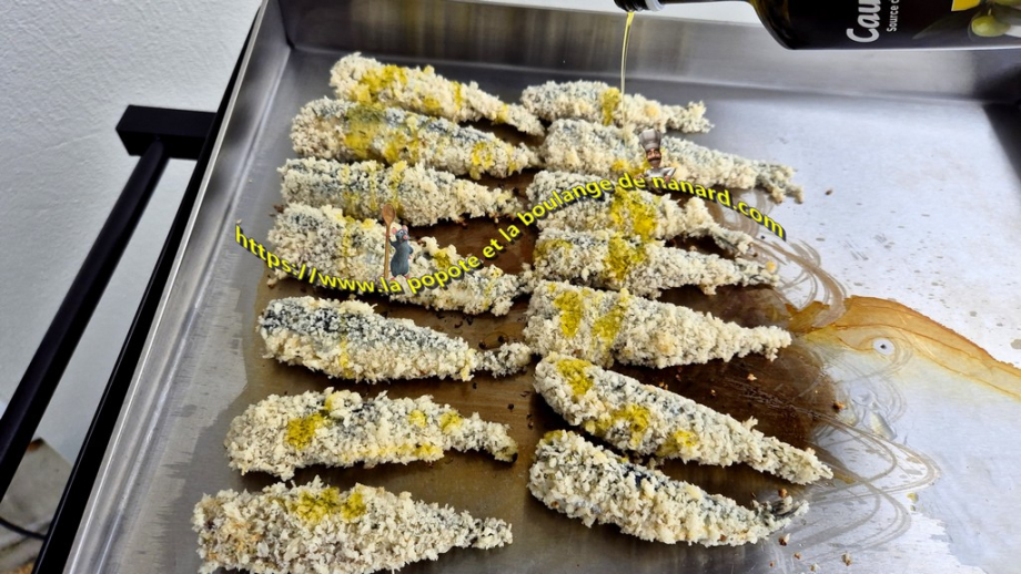 Déposer les sardines sur la plaque bien chaude puis les arroser d\\\'un filet d\\\'huile d\\\'olive