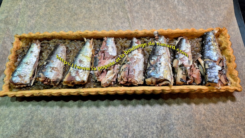 Déposer les sardines sur les oignons
